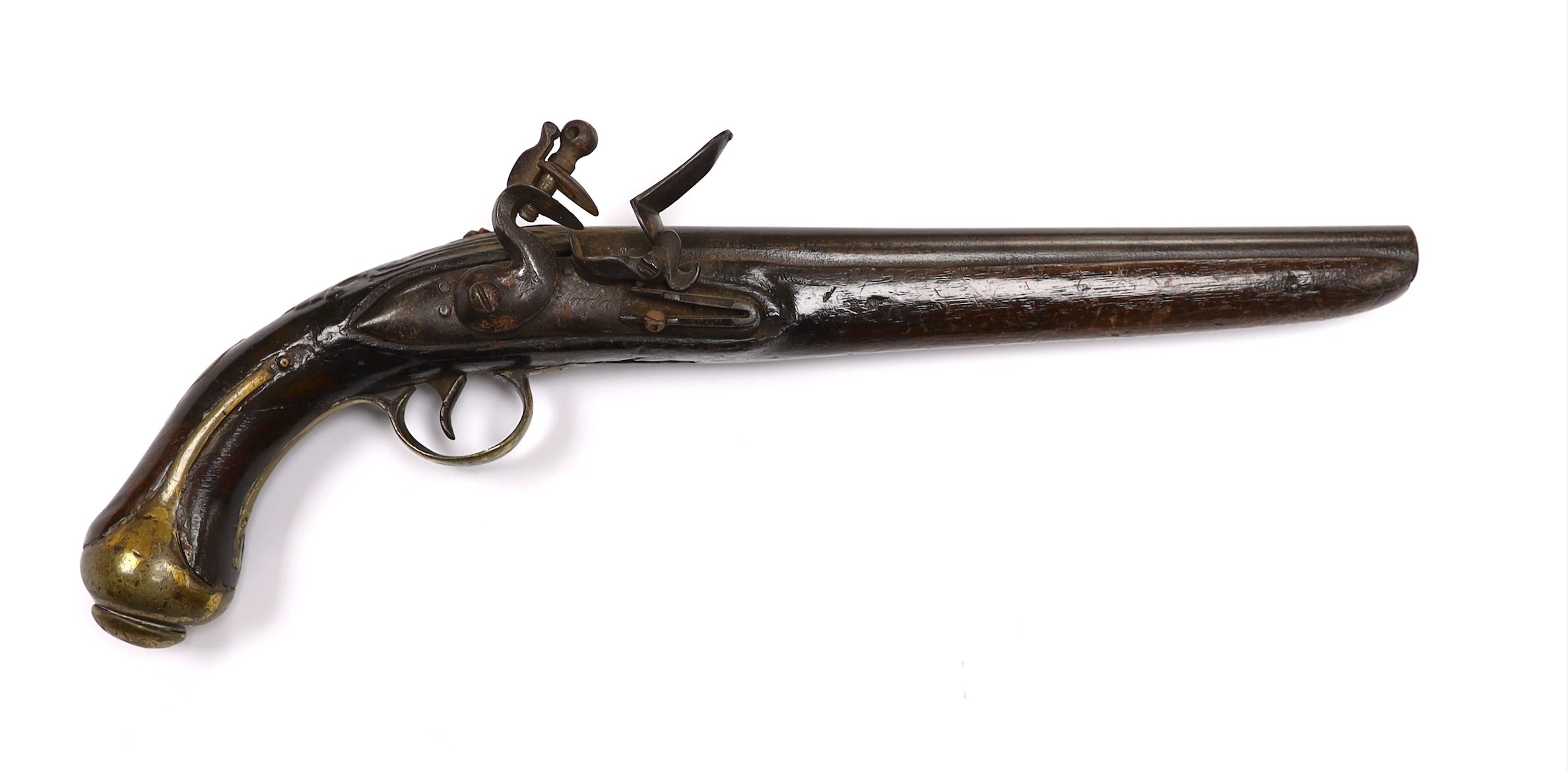 An early 19th century Balkan flintlock holster pistol. with limited engraving to lock and barrel and brass mounts (a.f.)